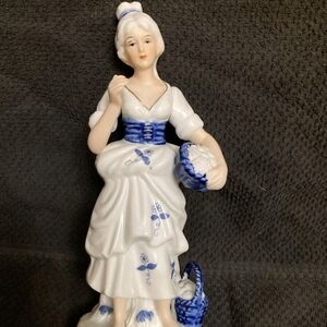 Porcelain Figurine with Blue Accents
